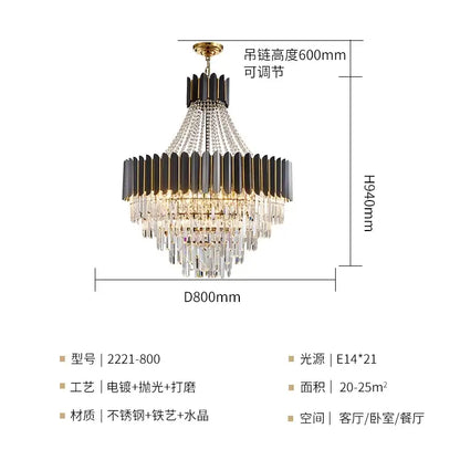 A decorbites crystal chandelier with tiered black and gold metal accents cascading crystal droplets and adjustable brass chain