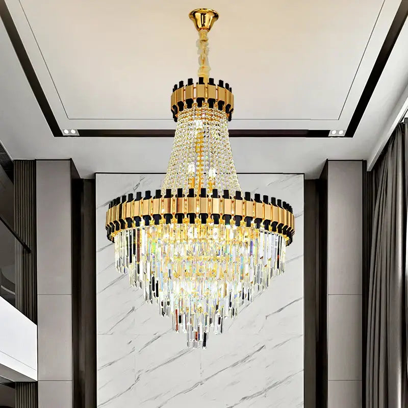 Decorbites crystal chandelier with cascading clear faceted crystals and polished brass frame for duplex villa living room
