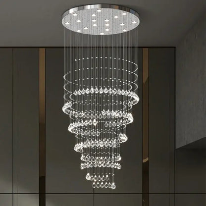 A modern decorbites crystal chandelier with clear faceted crystals and chrome mount for high ceilings living rooms