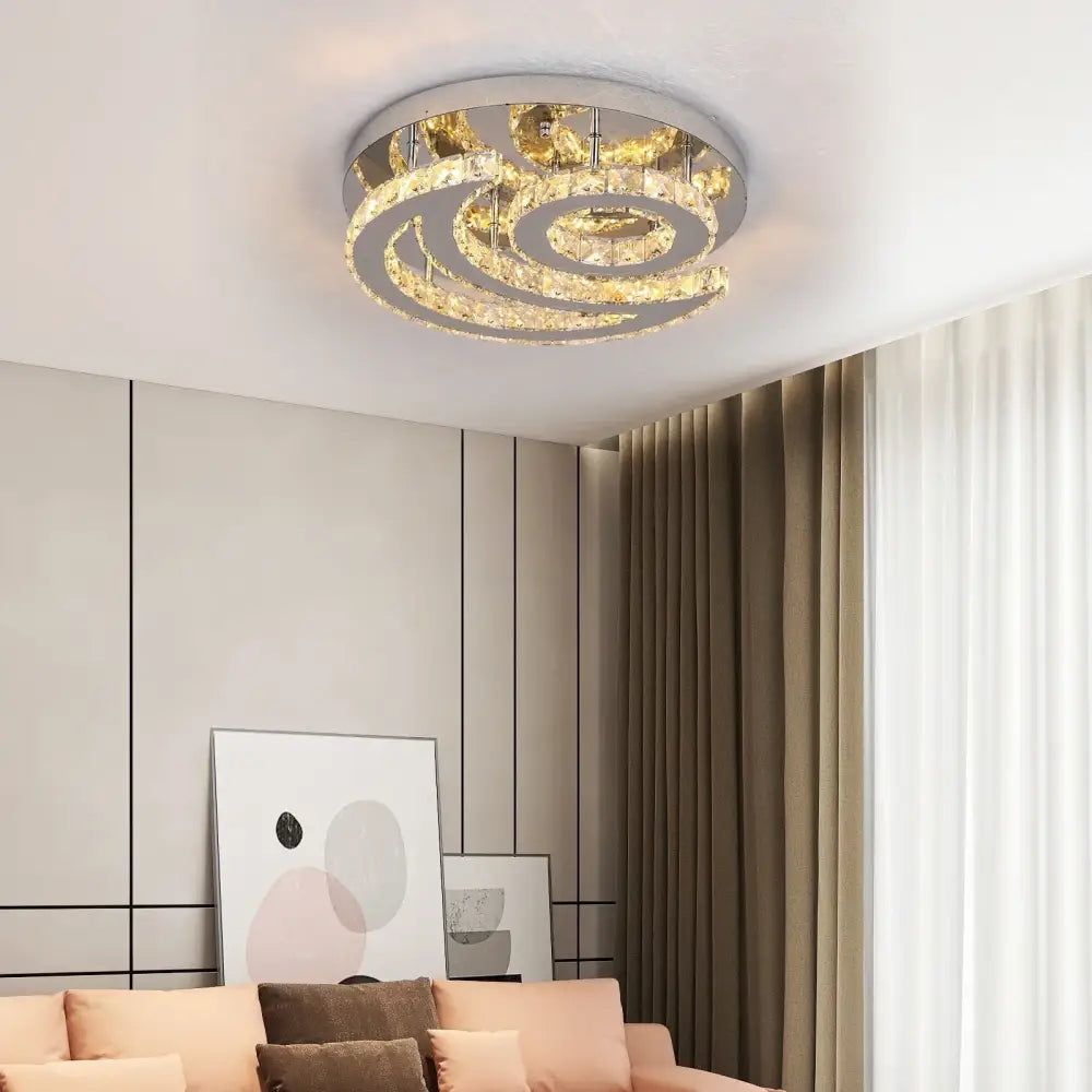 Modern DecorBites crystal chandelier ceiling light fixture with concentric clear crystal rings and polished chrome finish