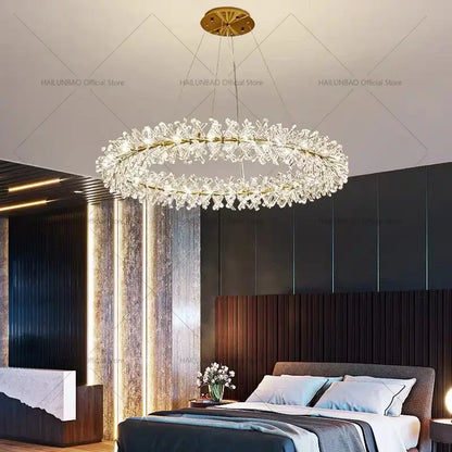 Elegant gold-toned DecorBites crystal chandelier featuring sparkling clear crystals for living and dining room lighting