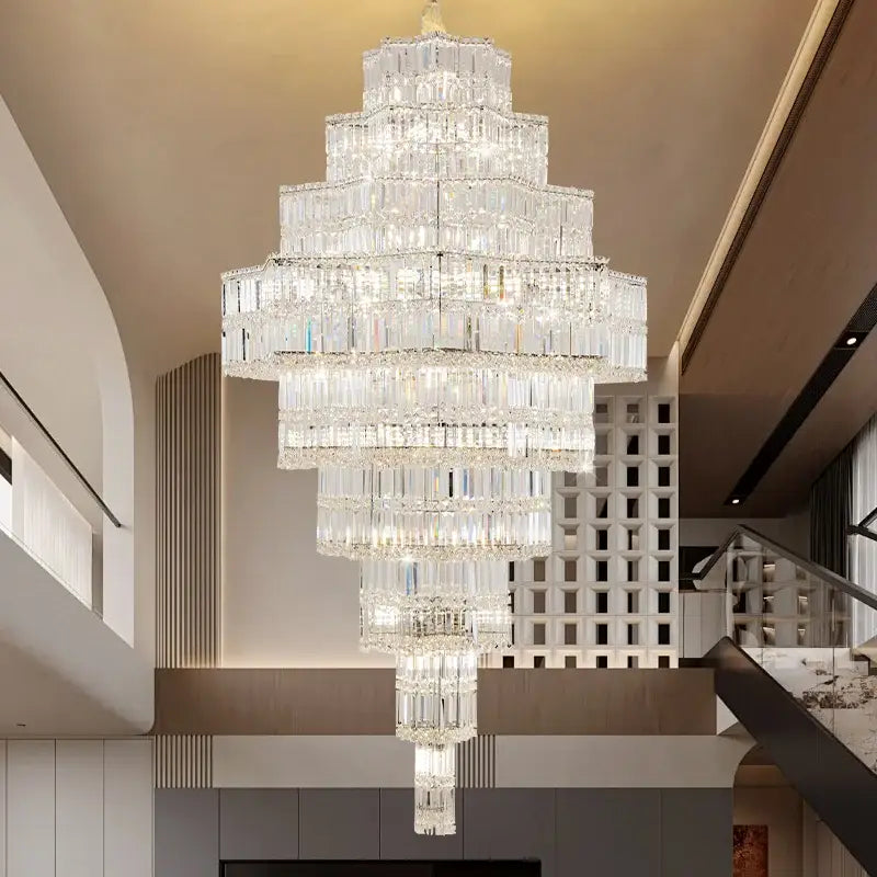 DecorBites crystal chandelier with cascading rectangular prisms glowing warmly in a post-modern European duplex villa