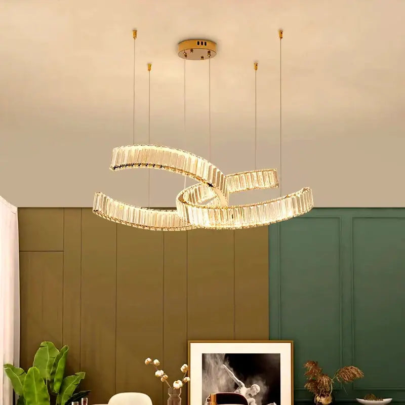 Gold-toned decorbites crystal chandelier featuring interlocking crystal rings for modern home decoration and lighting