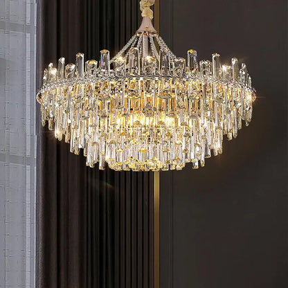 Decorbites crystal chandelier with cascading clear and golden prisms on polished gold frame for modern luxe homes