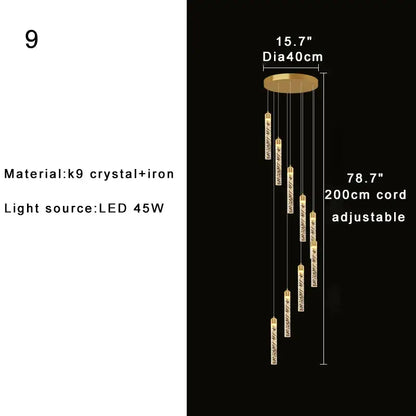 Gold-toned decorbites crystal chandelier with cascading cylindrical pendants for two-storey foyer and circular stairwell