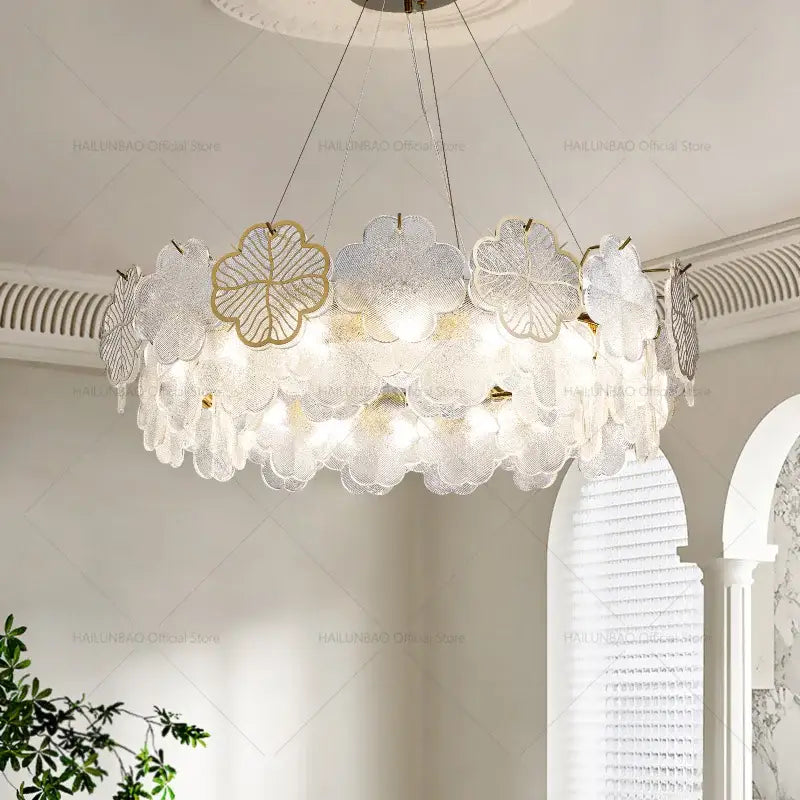 Elegant white and gold leaf-shaped decorbites crystal chandelier with intricate glass petals for living spaces