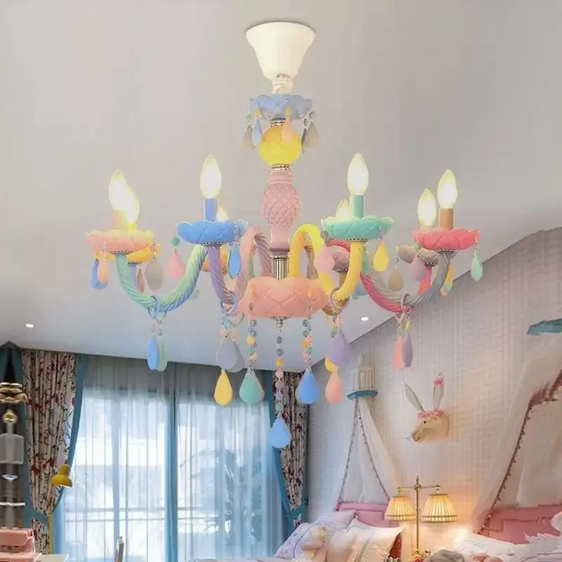 Pastel-colored DecorBites crystal chandelier with candy cane arms and teardrop ornaments for kids bedroom lighting
