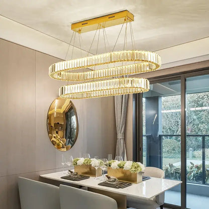 Gold-toned decorbites crystal chandelier with double rings and faceted crystal accents for LED dimmable stair lighting