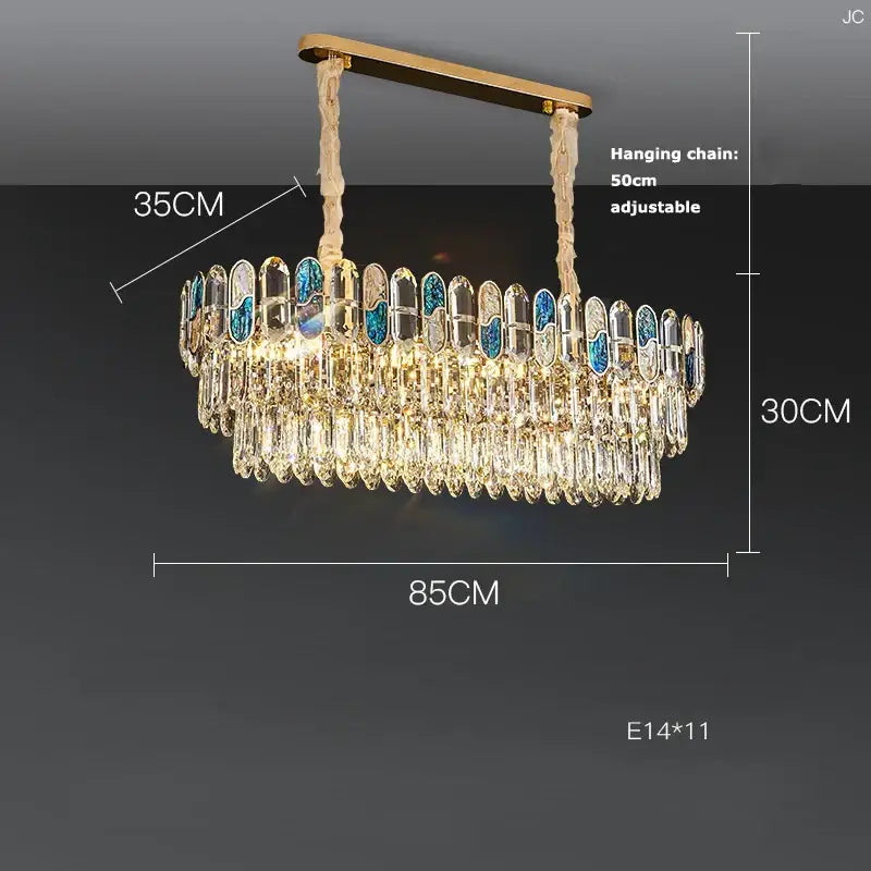 Gold-toned decorbites crystal chandelier led lighting with cascading clear crystal droplets and blue-tinted oval accents for living room