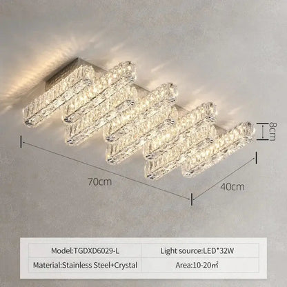 Modern decorbites crystal chandelier with sleek stainless steel frame and cascading clear faceted crystals for living room lighting