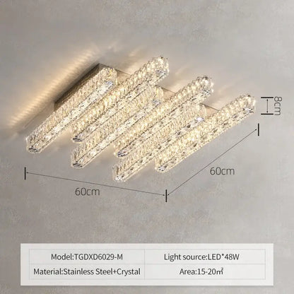 Modern rectangular decorbites crystal chandelier with five crystal bars on stainless steel base emitting warm led light