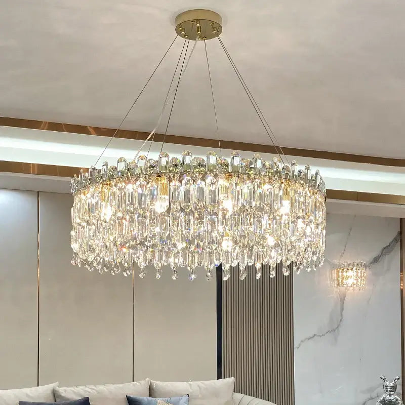 Decorbites crystal chandelier with gold ceiling mount and cascading clear crystals for luxe living room decor