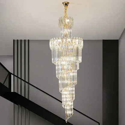 DecorBites crystal chandelier with cascading clear glass rods and gold-toned metal accents for luxe stairwell lighting