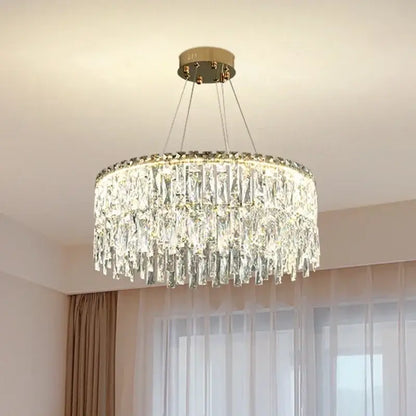 DecorBites crystal chandelier with cascading clear glass prisms and gold-toned ceiling mount for luxury lighting