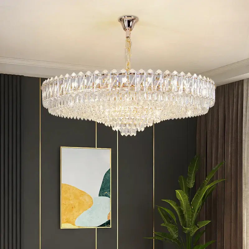 Elegant decorbites crystal chandelier with polished chrome finish and cascading clear faceted crystals for living room
