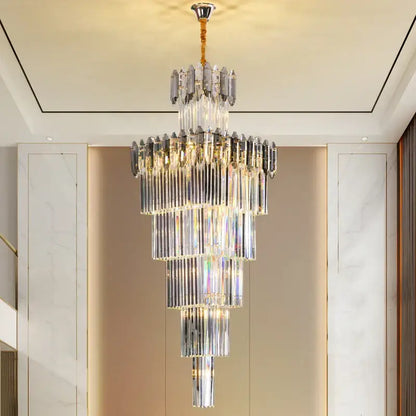 Decorbites crystal chandelier with multi-tiered cascading clear and frosted glass rods and gold-toned chain suspension