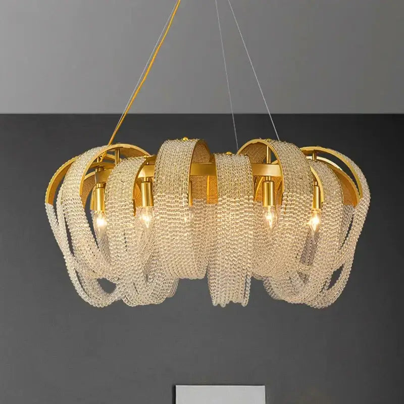 Gold-toned decorbites crystal chandelier with cascading clear crystal beads and exposed bulbs for luxury living room lighting