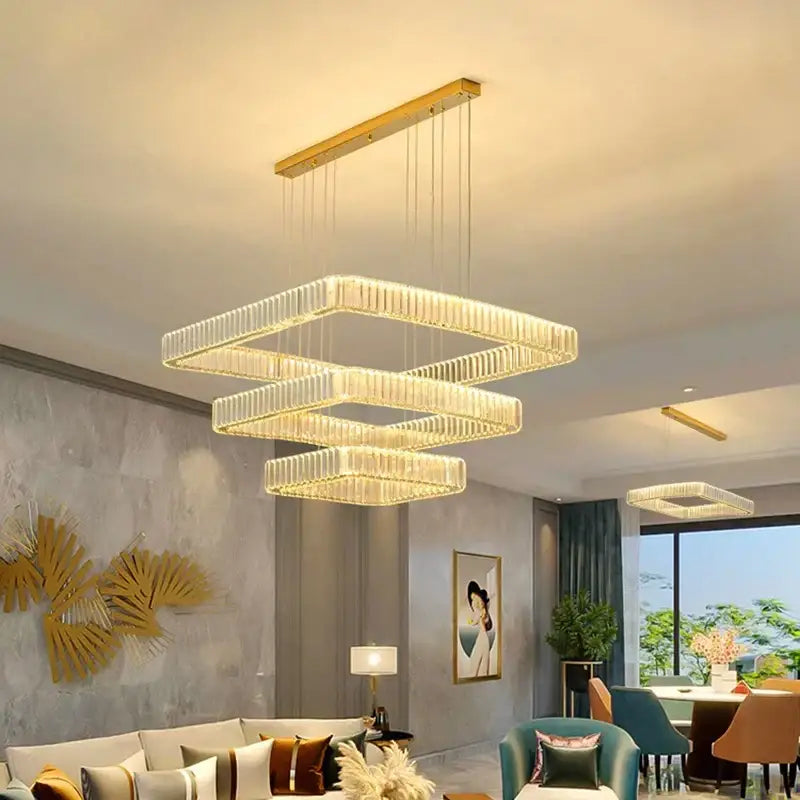 Modern gold-toned decorbites crystal chandelier with layered illuminated crystal panels for luxury living room lighting
