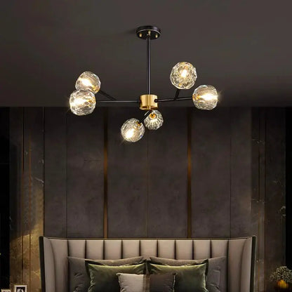 Modern decorbites crystal chandelier with five clear glass globe bulbs on black metal frame for living and dining rooms