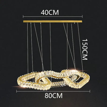 Gold-toned decorbites crystal chandelier with interlocking rings and clear crystals for luxury living and dining rooms