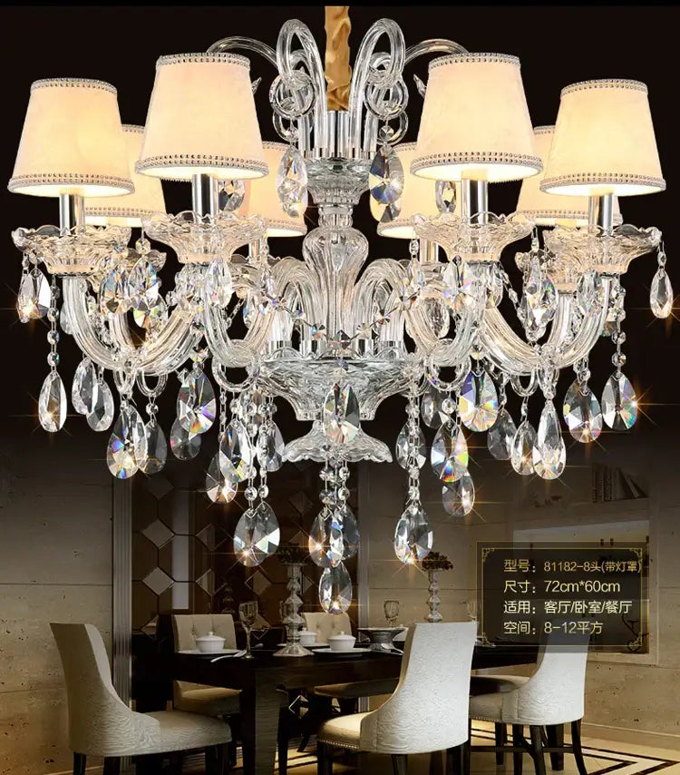 Crystal chandelier by DecorBites with eight cream lampshades and teardrop crystals for luxury living room lighting