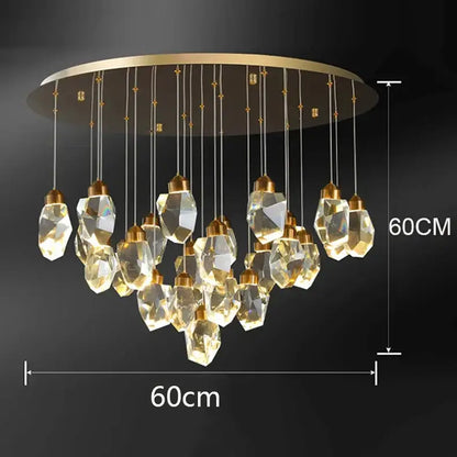 A decorbites crystal chandelier with circular gold ceiling mount and faceted clear crystal pendants for living room