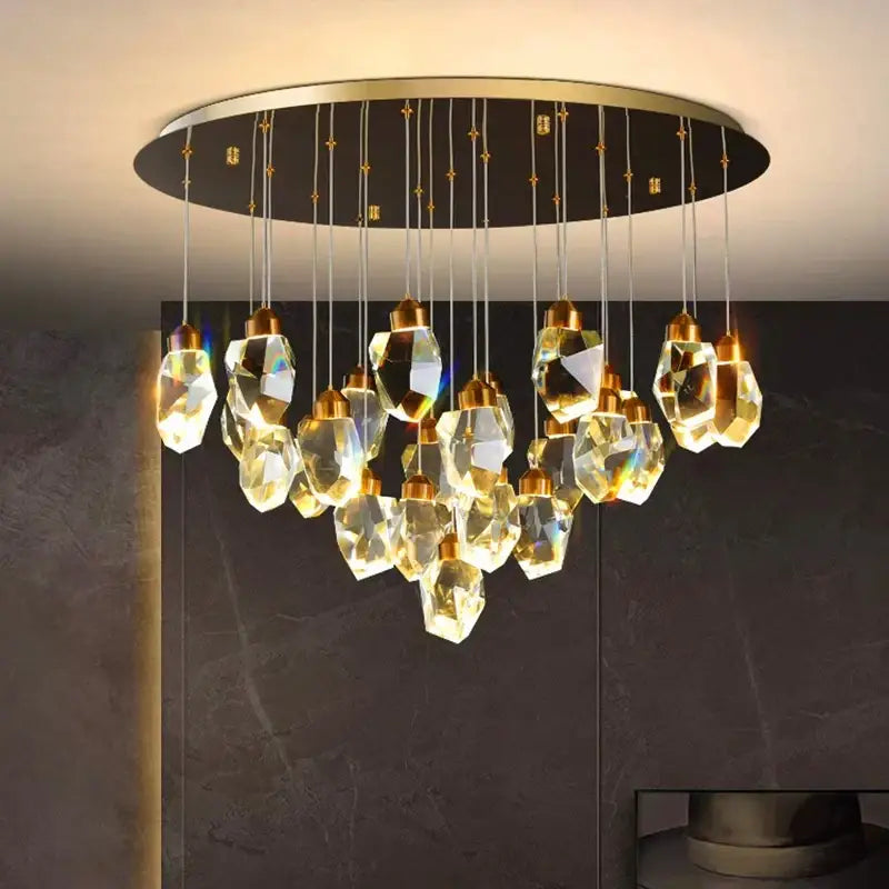 A decorbites crystal chandelier featuring faceted golden glass pendants on a sleek circular gold frame for living rooms