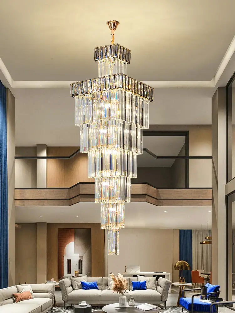 Decorbites crystal chandelier featuring gold-toned mount and cascading rectangular glass prisms for luxury loft lighting