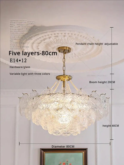 Elegant decorbites crystal chandelier with five layered tiers featuring clear glass petals and gold-toned hardware