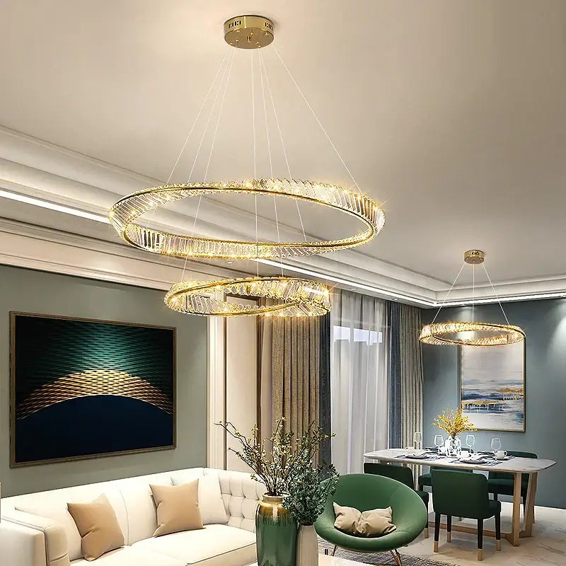 Gold-toned double-ring decorbites crystal chandelier with crystal accents for luxurious living room and bedroom lighting