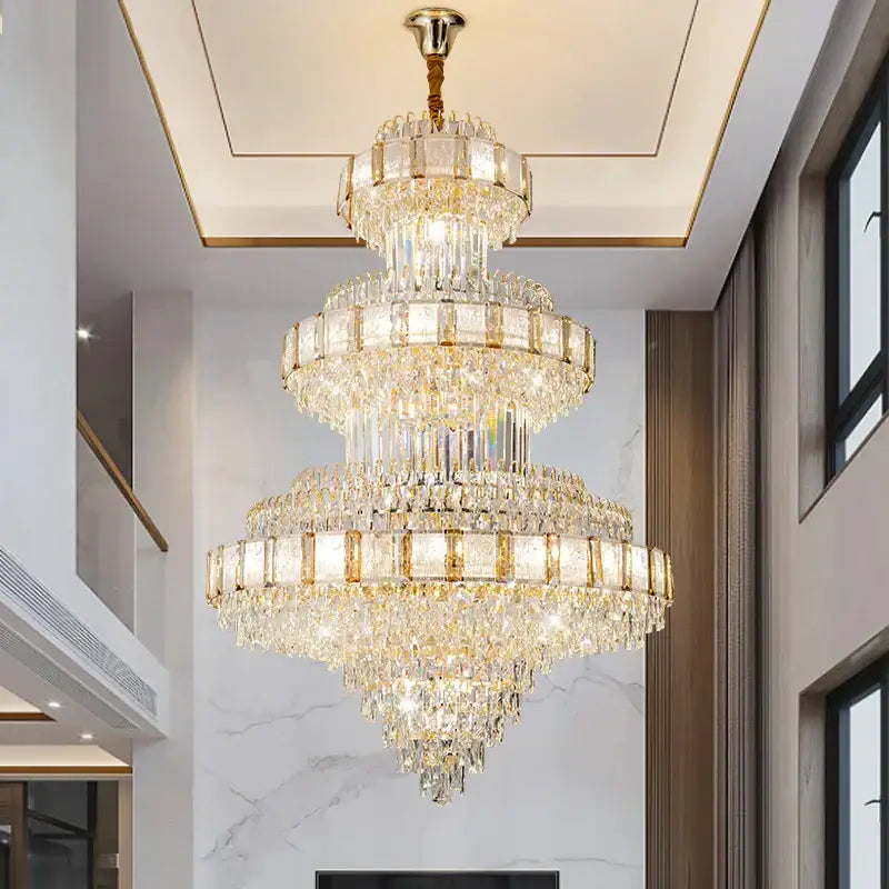 DecorBites crystal chandelier with gold-toned accents and cascading clear glass prisms for modern loft lighting