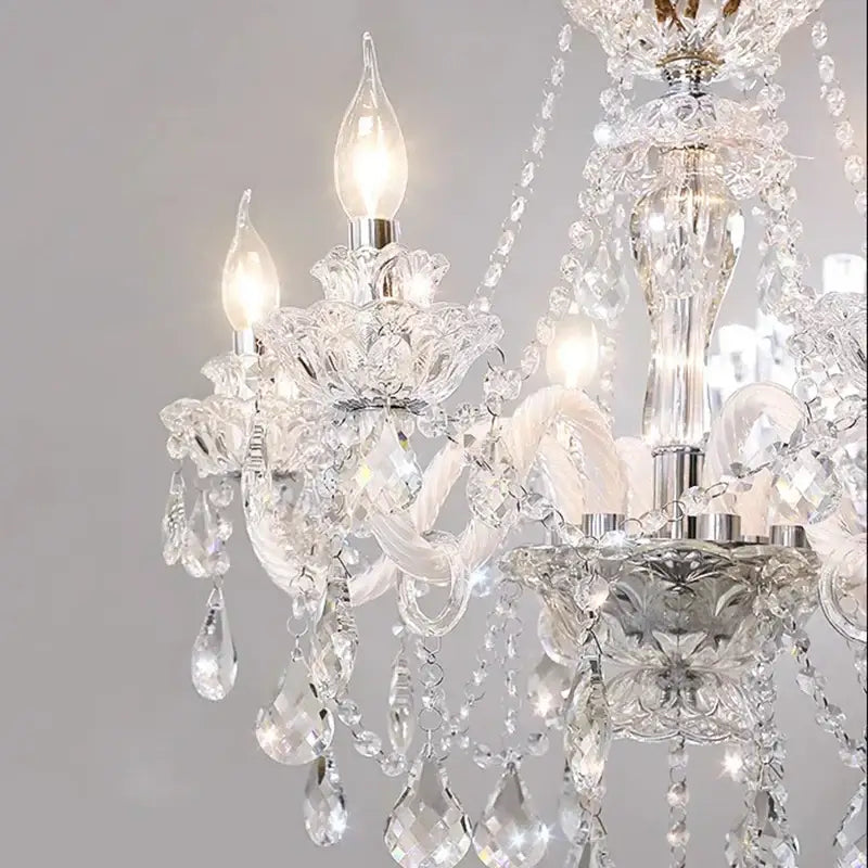 Decorbites crystal chandelier with intricate cut glass teardrop crystals and frosted white details for living room