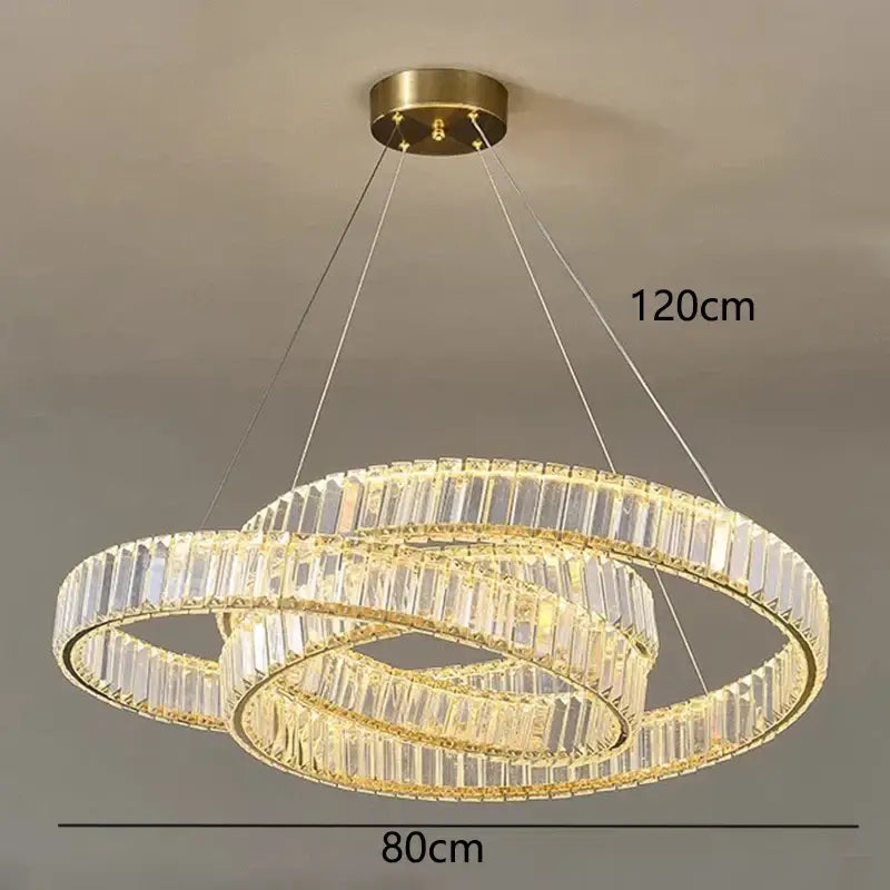Modern decorbites crystal chandelier with three interlocking rings crystal facets and gold-toned metal frame for interior lighting