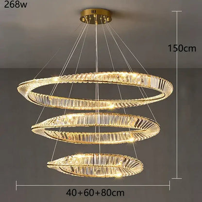 Gold-toned decorbites crystal chandelier with three concentric rings and faceted crystal accents for living room lighting