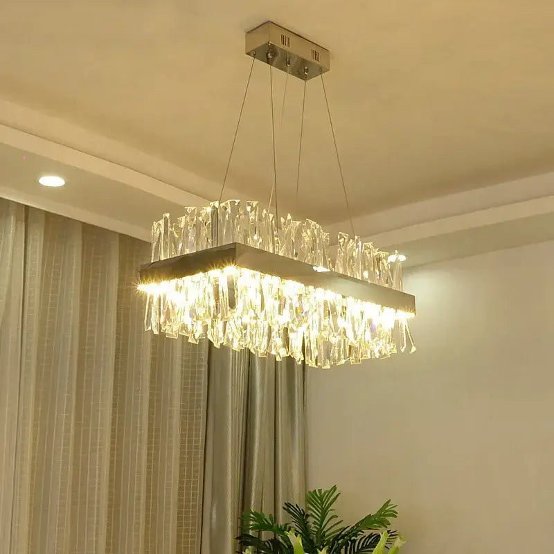 Rectangular decorbites crystal chandelier with sleek chrome gold frame and cascading clear glass prisms for modern lighting