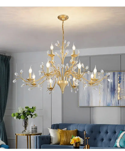 Gold-toned decorbites crystal chandelier with crystal accents and candle-style bulbs for modern vintage lighting