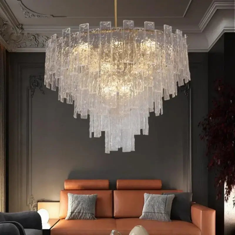 A decorbites crystal chandelier with cascading translucent glass rods emitting warm light for modern home decor