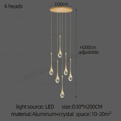 Gold-toned decorbites crystal chandelier with six teardrop led lights suspended from circular aluminum base