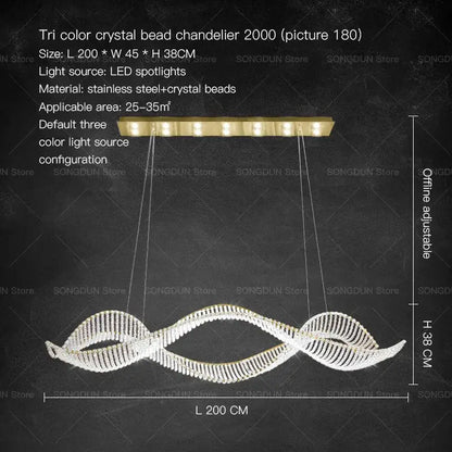 A sleek decorbites crystal chandelier with tri-color beads and gold stainless steel frame for modern luxury lighting