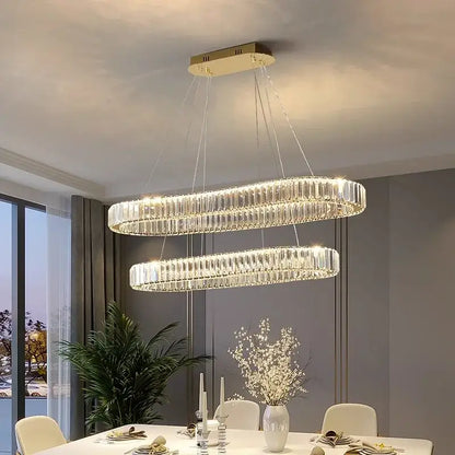 Modern double-ring decorbites crystal chandelier with clear crystal rods and gold-toned ceiling mount for living room