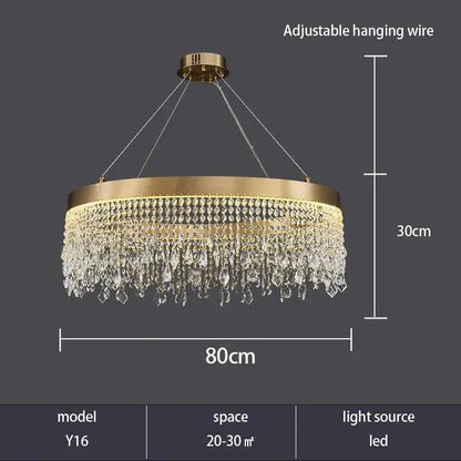 Gold-toned circular decorbites crystal chandelier with cascading crystal droplets and led lighting for modern living spaces