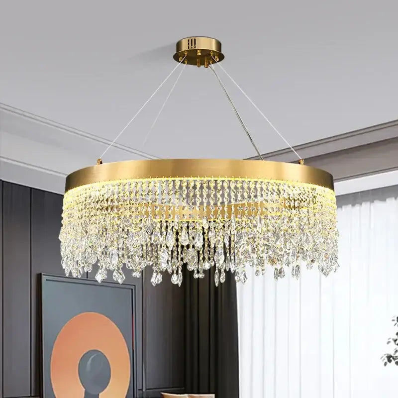 Gold-toned decorbites crystal chandelier with cascading clear crystal droplets for modern living and dining rooms