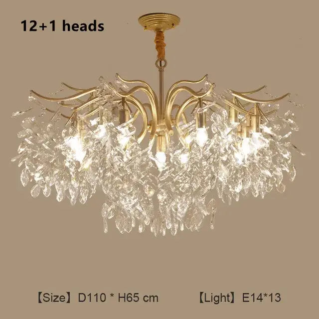 Gold-toned decorbites crystal chandelier with 12+1 crystal leaf arms and clear glass droplets for modern luxe lighting
