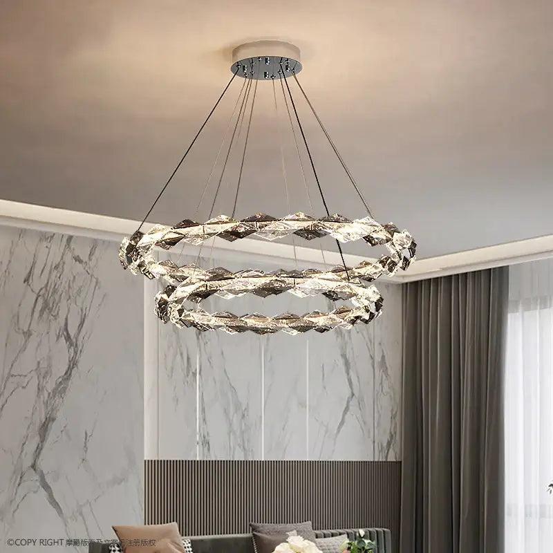 Modern double-ring decorbites crystal chandelier with faceted crystals and sleek chrome finish for duplex staircase lighting