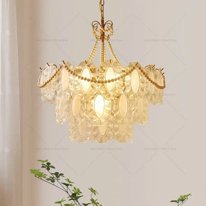 Gold-toned decorbites crystal chandelier with cascading clear oval crystals and beads for living room and bedroom luxury