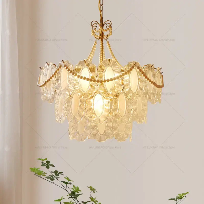 Gold-toned decorbites crystal chandelier with cascading clear oval crystals and beads for living room and bedroom luxury