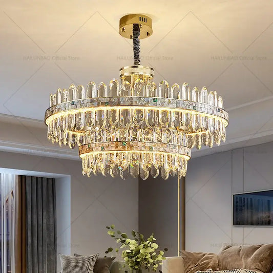 Luxurious decorbites crystal chandelier with gold-toned metal and clear prisms emitting warm glow for modern living spaces