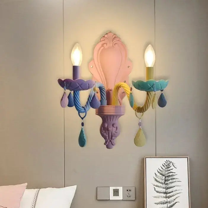 Pastel pink and purple ornate wall sconce with colorful braided cords and teardrop pendants for decorbites crystal chandelier modern macaron collection