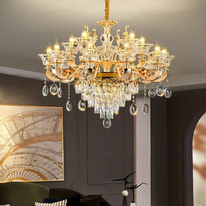 Gold-toned decorbites crystal chandelier pendant with intricate ornate detailing and faceted glass droplets for luxury décor