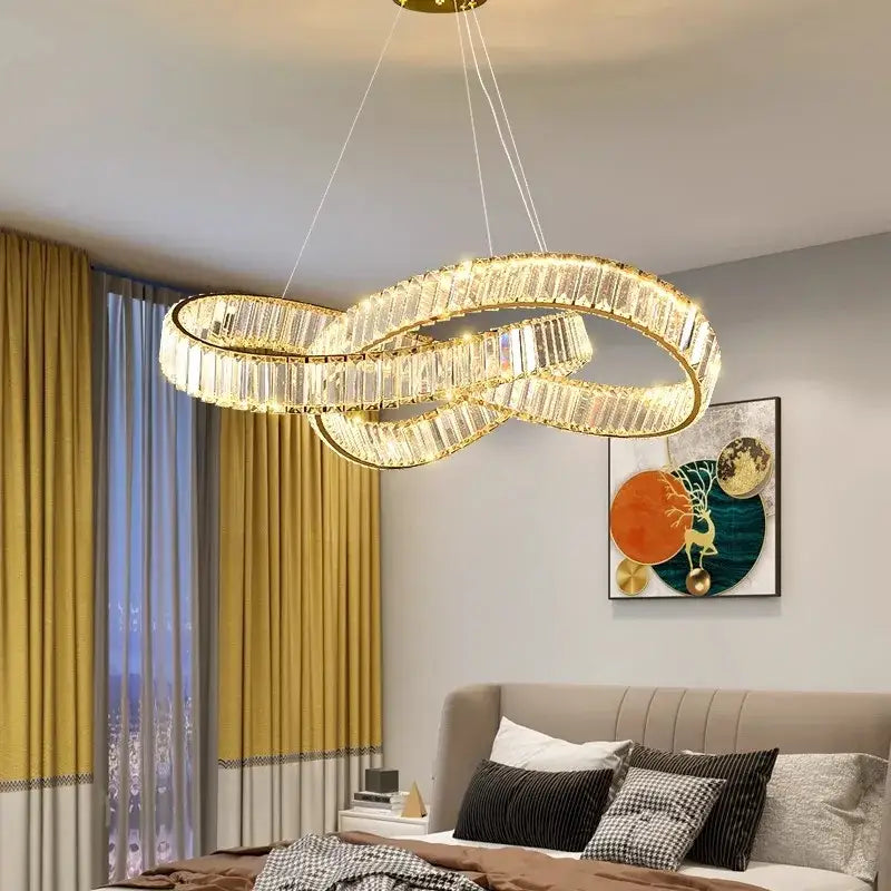 Golden infinity-loop decorbites crystal chandelier pendant lamp with faceted crystal accents for modern home lighting